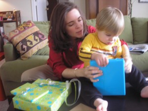 Opening a present from Mama & Daddy