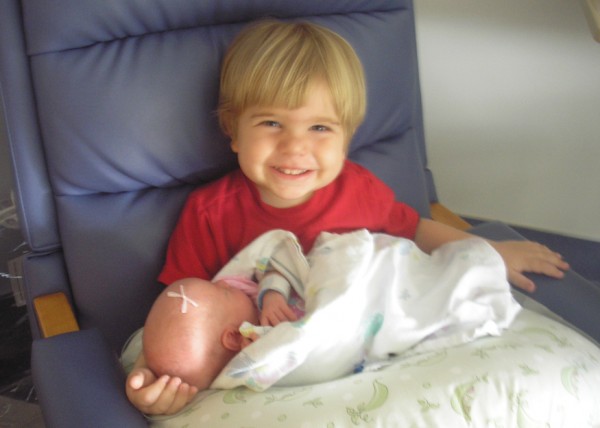 Reed holding his sister