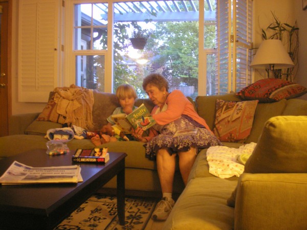 Mamau and Reed enjoying a book - 08/15/09
